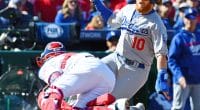 Los Angeles Dodgers third baseman Justin Turner slides into home plate