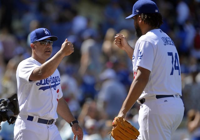 Los Angeles Dodgers manager Dave Roberts and Kenley Jansen celebrate after a win