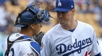 Los Angeles Dodgers catcher Austin Barnes speaks with Ross Stripling