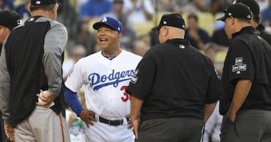 San Francisco Giants manager Bruce Bochy and Los Angeles Dodgers manager Dave Roberts with umpires before a game at Dodger Stadium