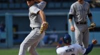 Los Angeles Dodgers infielder Max Muncy slides into second base