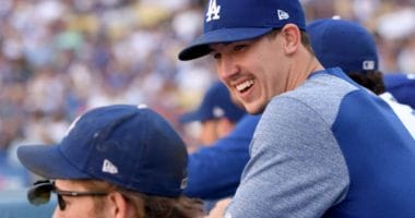 Los Angeles Dodgers pitchers Walker Buehler and Clayton Kershaw in the dugout at Dodger Stadium