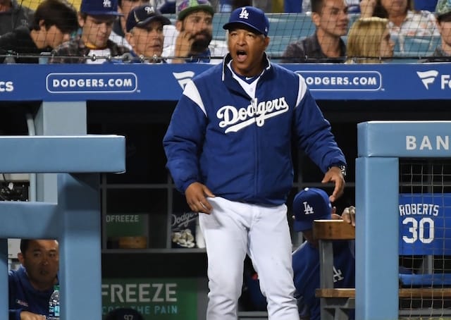Los Angeles Dodgers manager Dave Roberts reacts during a game
