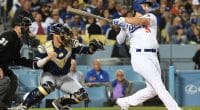 Los Angeles Dodgers outfielder Joc Pederson hits a home run against the Milwaukee Brewers