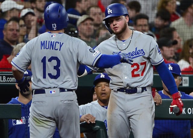 Los Angeles Dodgers teammates Max Muncy and Alex Verdugo celebrate