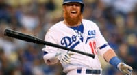 Los Angeles Dodgers third baseman Justin Turner reacts after being hit by a pitch