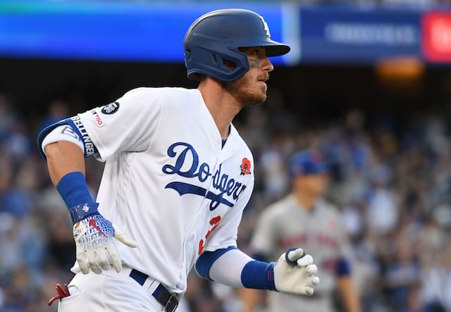 Los Angeles Dodgers right fielder Cody Bellinger rounds the bases after hitting a home run off New York Mets starting pitcher Jacob deGrom