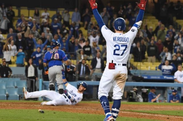 Alex Verdugo celebrates as Cody Bellinger scores a game-winning run in a walk-off win for the Los Angeles Dodgers