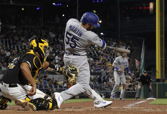 Los Angeles Dodgers catcher Russell Martin bats during a game against the Pittsburgh Pirates