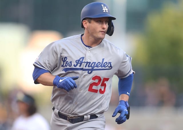 Los Angeles Dodgers infielder David Freese rounds the bases after hitting a grand slam at PNC Park