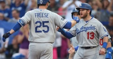 Los Angeles Dodgers infielder David Freese celebrates with Russell Martin after hitting a grand slam