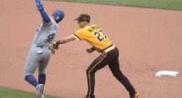 Los Angeles Dodgers infielder Matt Beaty attempts to avoid a tag during a game against the Pittsburgh Pirates