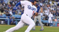 Los Angeles Dodgers infielder Max Muncy runs on an RBI double against the New York Mets