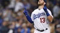 Los Angeles Dodgers infielder Max Muncy rounds the bases after hitting a home run against the Philadelphia Phillies