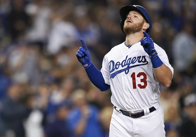 Los Angeles Dodgers infielder Max Muncy rounds the bases after hitting a home run against the Philadelphia Phillies