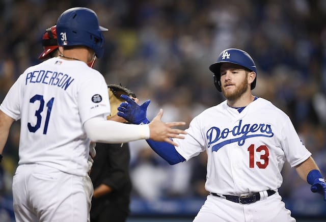 Los Angeles Dodgers infielder Max Muncy celebrates with outfielder Joc Pederson after hitting a home run against the Philadelphia Phillies
