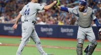 Los Angeles Dodgers starting pitcher Rich Hill and Russell Martin celebrate