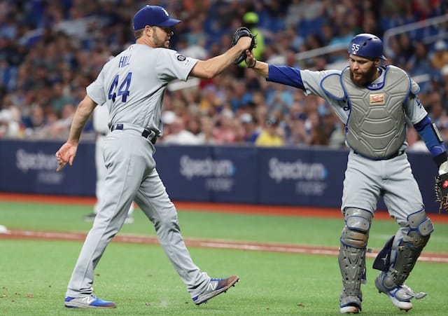 Los Angeles Dodgers starting pitcher Rich Hill and Russell Martin celebrate