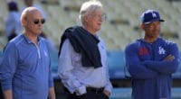 Los Angeles Dodgers president and CEO Stan Kasten, manager Dave Roberts and owner Mark Walter watch batting practice at Dodger Stadium