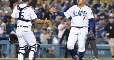Austin Barnes and Julio Urias celebrate after the Los Angeles Dodgers defeat the Chicago Cubs