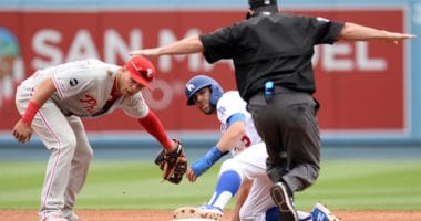Los Angeles Dodgers infielder Chris Taylor steals second base against the Philadelphia Phillies