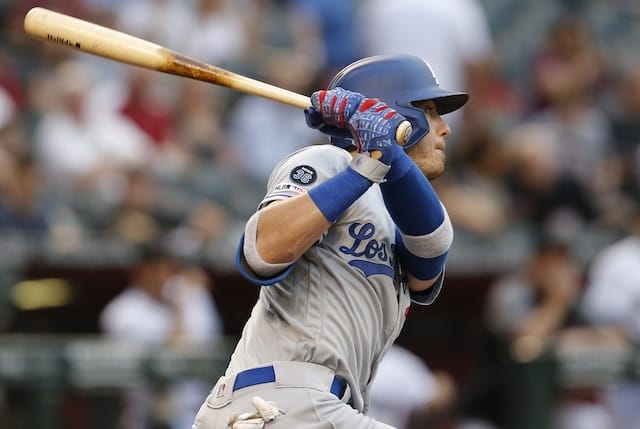 Los Angeles Dodgers right fielder Cody Bellinger hits a two-run triple against the Arizona Diamondbacks