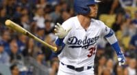 Los Angeles Dodgers right fielder Cody Bellinger hits a home run against the Colorado Rockies