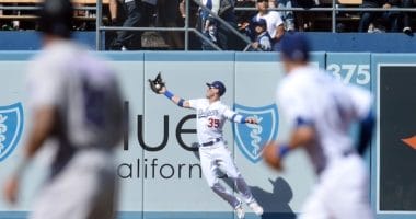 Los Angeles Dodgers right fielder Cody Bellinger makes a leaping catch at Dodger Stadium