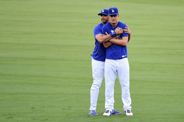 Los Angeles Dodgers teammates Cody Bellinger and Andre Ethier prior to a 2017 World Series game