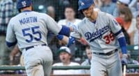 Los Angeles Dodgers first baseman Cody Bellinger congratulates Russell Martin
