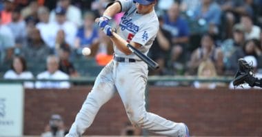 Los Angeles Dodgers shortstop Corey Seager hits a double against the San Francisco Giants