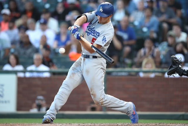 Los Angeles Dodgers shortstop Corey Seager hits a double against the San Francisco Giants