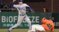 Los Angeles Dodgers shortstop Corey Seager turns a double play