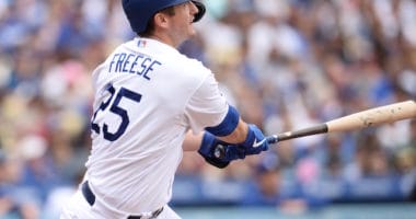 Los Angeles Dodgers first baseman David Freese hits a home run against the Philadelphia Phillies