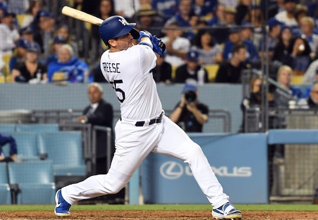 Los Angeles Dodgers first baseman David Freese hits a home run against the Chicago Cubs