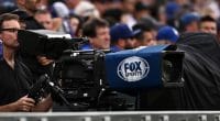 General view of a Fox Sports camera and cameraman at Coors Field