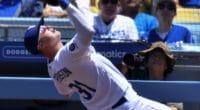 Los Angeles Dodgers first baseman Joc Pederson makes a catch in foul territory