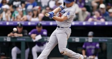 Los Angeles Dodgers outfielder Joc Pederson hits a two-run single against the Colorado Rockies