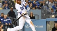 Los Angeles Dodgers third baseman Justin Turner hits a double against the San Francisco Giants