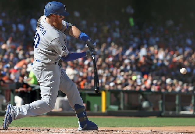 Los Angeles Dodgers third baseman Justin Turner gets a hit against the San Francisco Giants