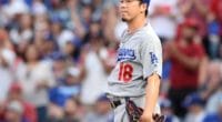 Los Angeles Dodgers starting pitcher Kenta Maeda reacts after allowing a home run against the Los Angeles Angels of Anaheim