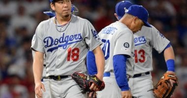 Los Angeles Dodgers manager Dave Roberts removes starting pitcher Kenta Maeda from a game against the Los Angeles Angels of Anaheim