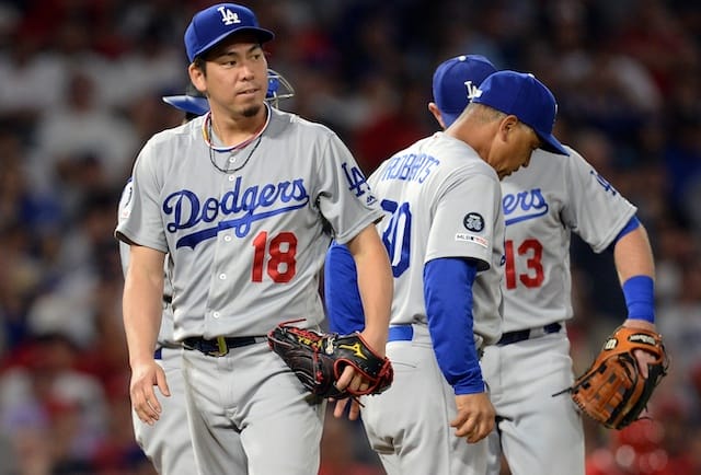 Los Angeles Dodgers manager Dave Roberts removes starting pitcher Kenta Maeda from a game against the Los Angeles Angels of Anaheim