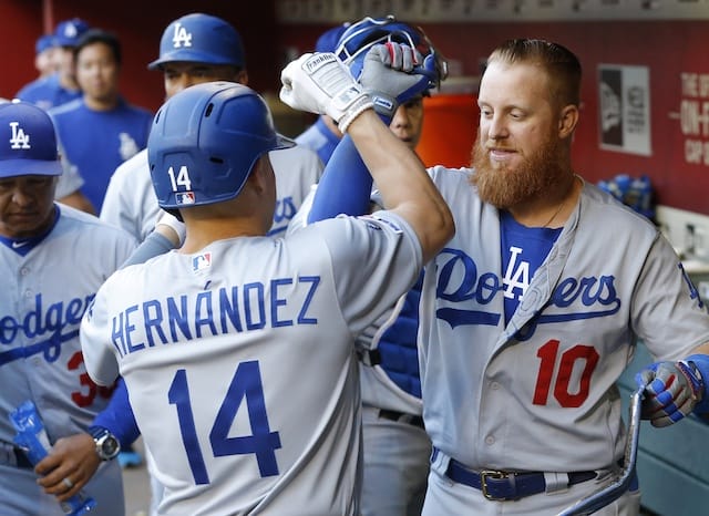 Los Angeles Dodgers second baseman Kiké Hernandez celebrates with Justin Turner after hitting a home run off Robbie Ray