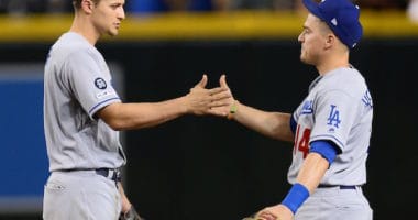 Los Angeles Dodgers teammates Kiké Hernandez and Corey Seager celebrate a win against the Arizona Diamondbacks