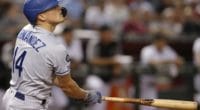 Los Angeles Dodgers second baseman Kiké Hernandez hits a home run against the Arizona Diamondbacks