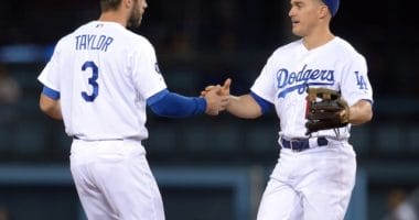 Kiké Hernandez and Chris Taylor celebrate after a Los Angeles Dodgers win at Dodger Stadium