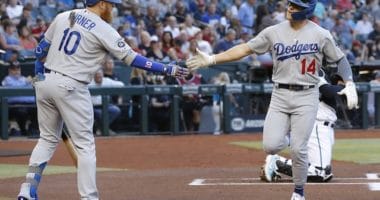 Los Angeles Dodgers second baseman Kiké Hernandez celebrates with Justin Turner after hitting a home run off Robbie Ray