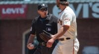 San Francisco Giants starting pitcher Madison Bumgarner talks with home-plate umpire Will Little