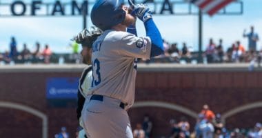 Los Angeles Dodgers infielder Max Muncy reacts after hitting a home run against the San Francisco Giants